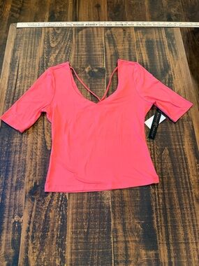 Almost Famous Bright Coral Pink V-Neck Short Sleeve Top with Strappy Back Detail